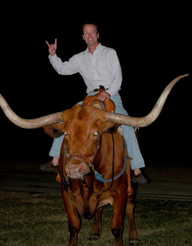 Todd on Texas Long Horn with 'hook em' horns