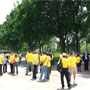 Advocates and Survivors in yellow waiting for the press event to begin.