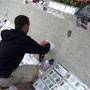 Darren does a rubbing of a fallen Wichita, KS officer.